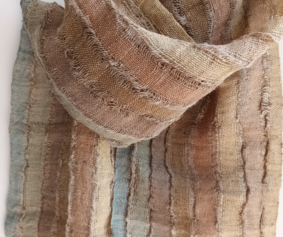 Woven nettle scarf showing various natural colours